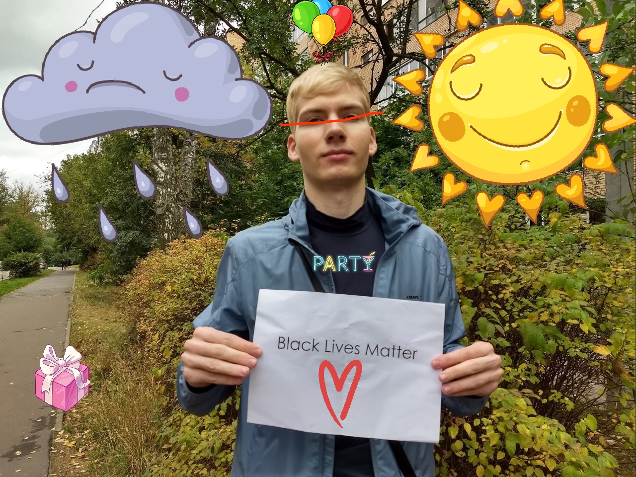 📷 Тот же мужчина в синей куртке «PARTY» (лицо перечёркнуто) держит лист бумаги с надписью «Black Lives Matter» и нарисованным сердечком. Стикеры: плачущая тучка, разноцветные шарики, солнышко.